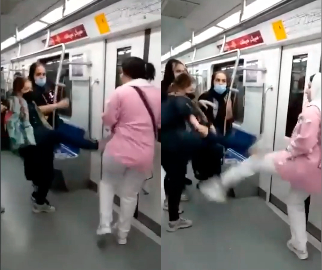 Tehran metrosunda maska üstündə qızlar təpik davasına çıxdılar - VİDEO